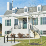 Thumbnail of driveway and building fronts