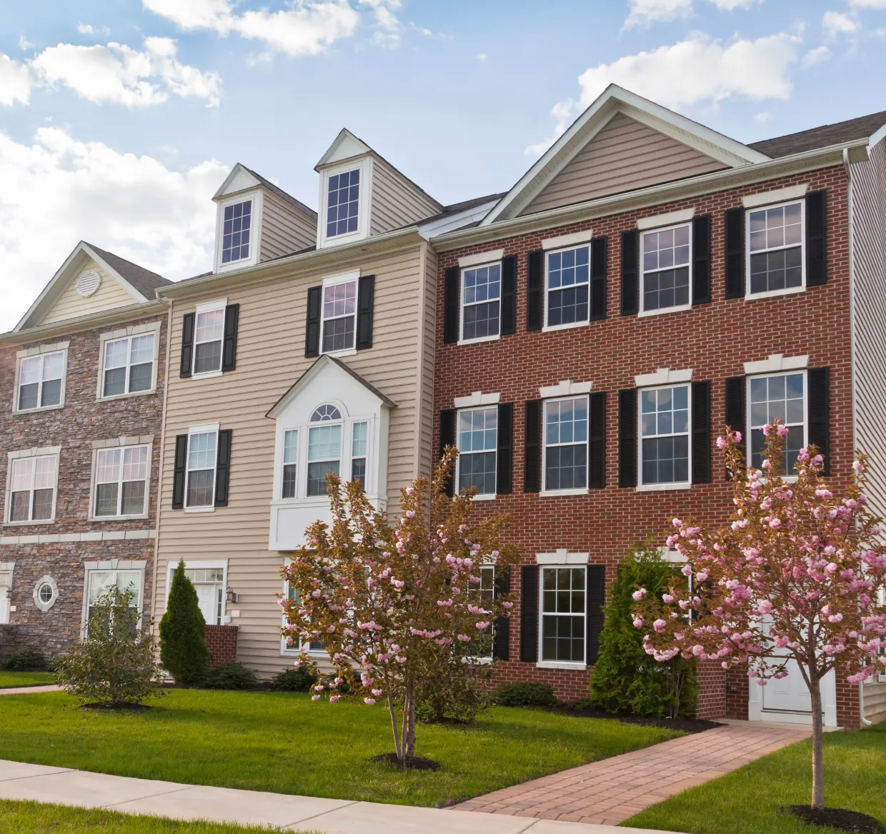 Beautiful townhome exteriors at the Meridian Crossing community in Bear, Delaware