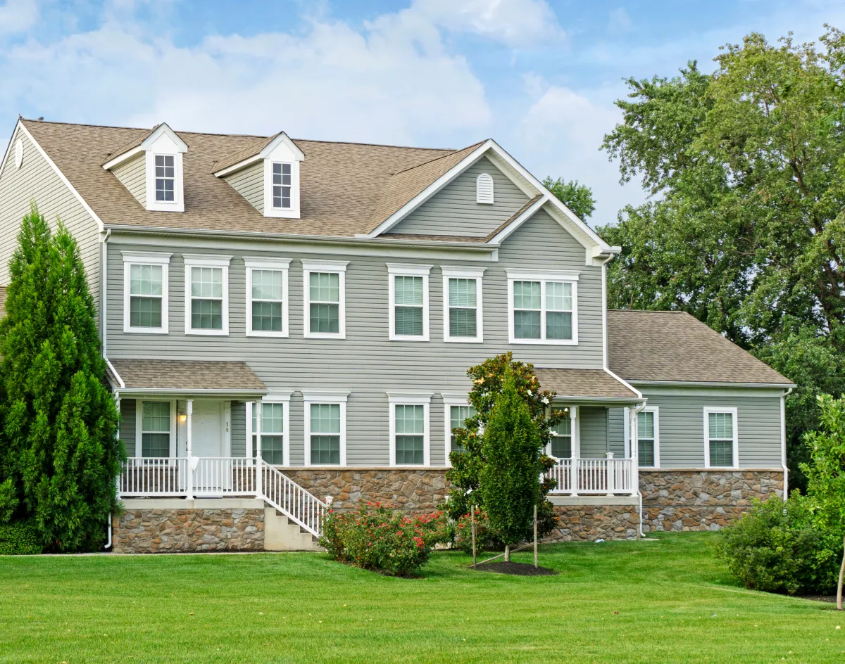 Lush landscaping surrounds each luxury twin home Lush landscaping surrounds each luxury twin home